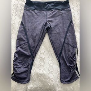 Lululemon size 8 leggings purple blue and grey stripped. Back zipper pocket
